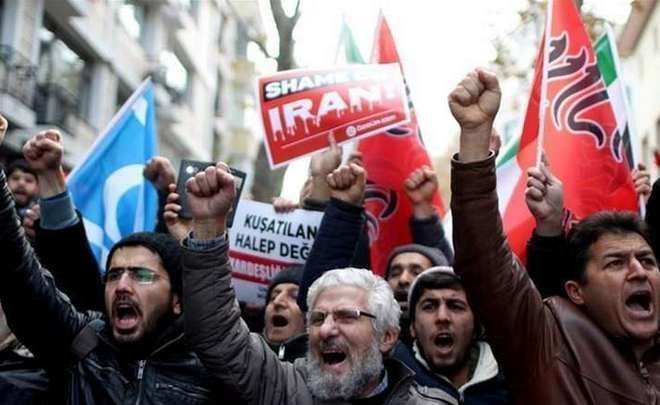 “Iranian politicians view the unrest as part of a hybrid US war against the country”